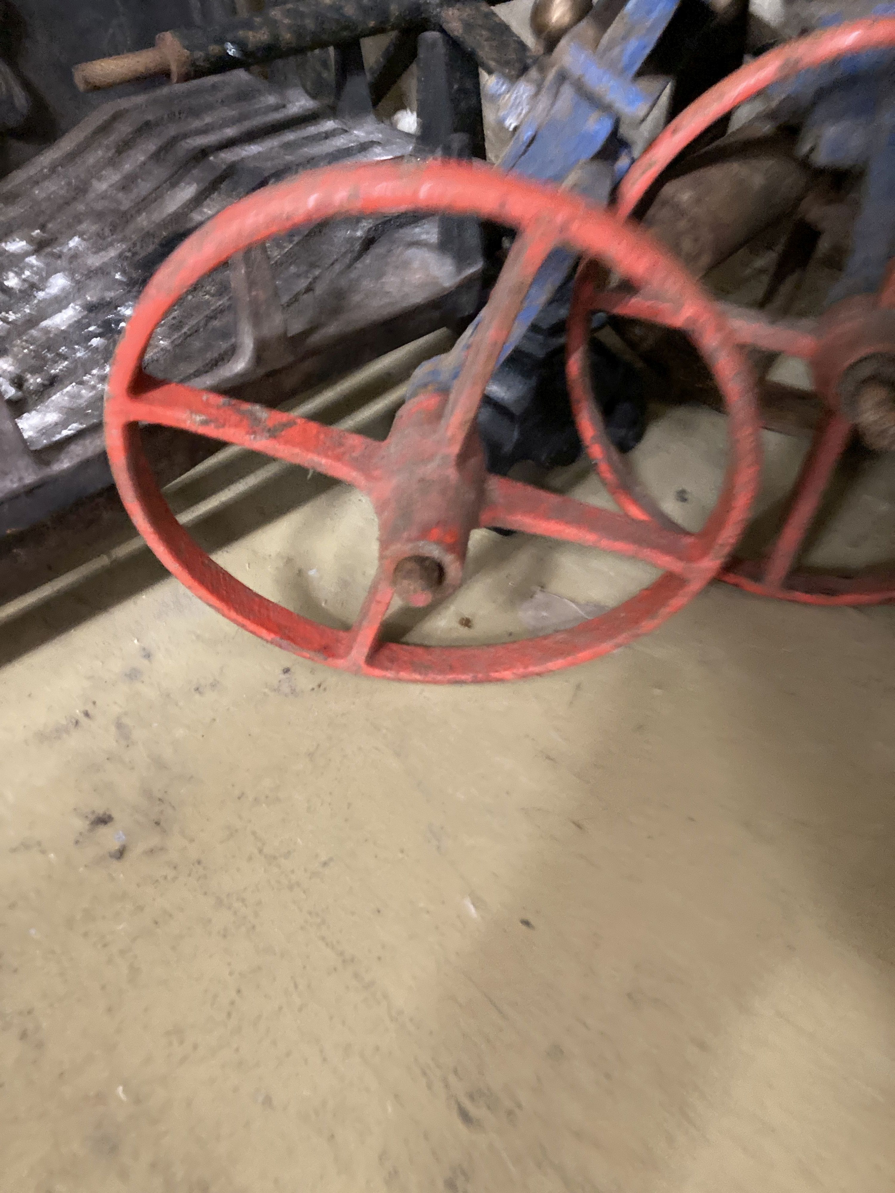 Four vintage cast iron wheels